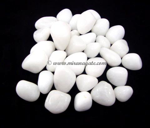 Manufacturers Exporters and Wholesale Suppliers of White Agate Tambled & Pebbles Khambhat Gujarat